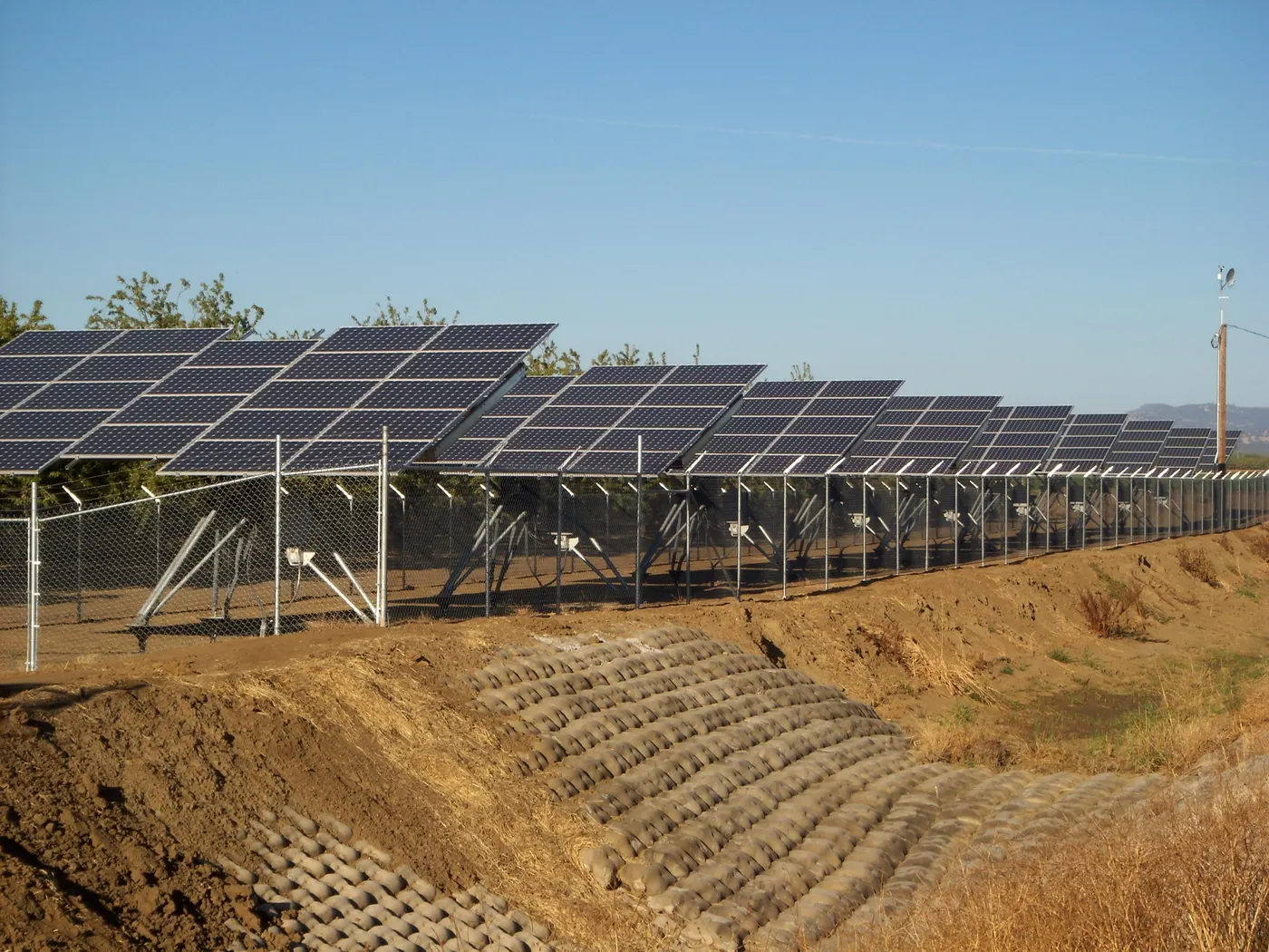 Ground-mounted solar array on a graded site